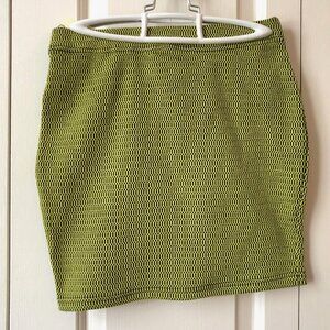 Lime green and black mini skirt with geometric pattern